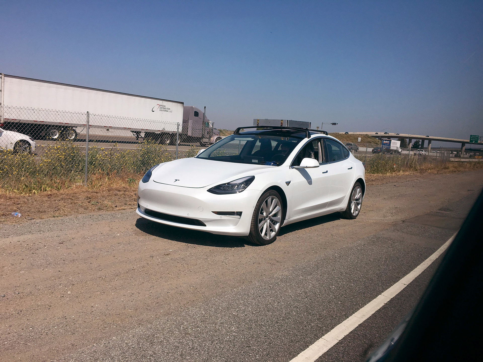 Tesla Model 3 testing with a roof rack system