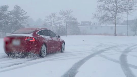 Tesla Model 3 running in snow. EVs Tesla Cold Weather How To