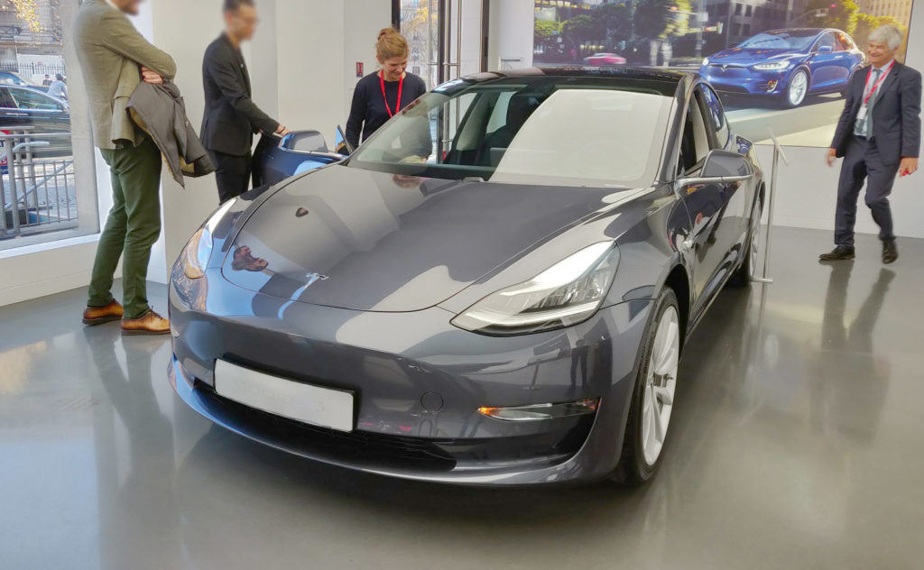 Tesla Model 3 in Mindnight Silver Metallic on display at the Tesla Store in Paris France