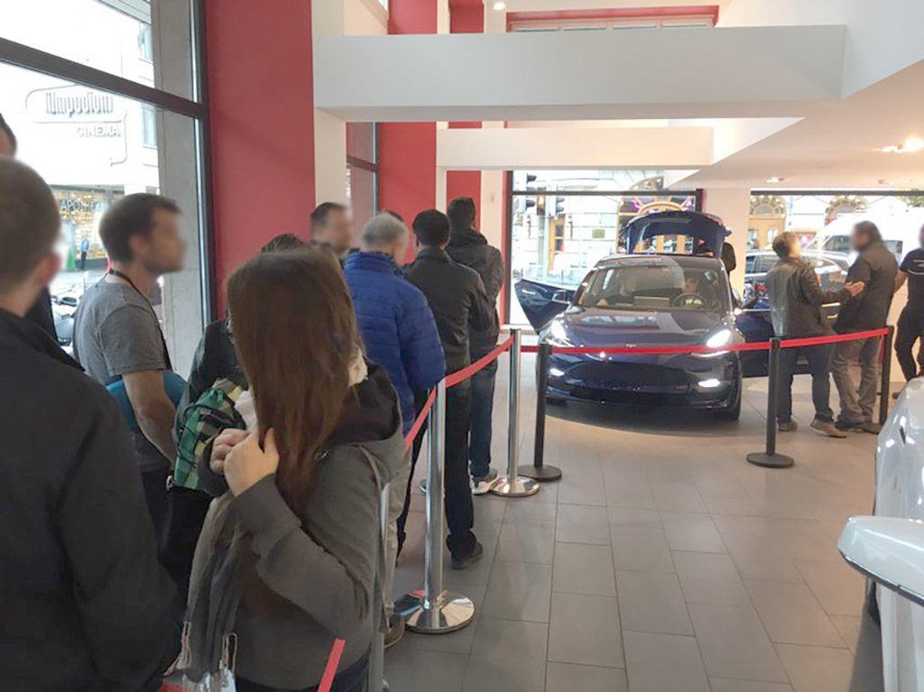 Tesla Model 3 on display in Sweden - People waiting for their turn to experience the Model 3