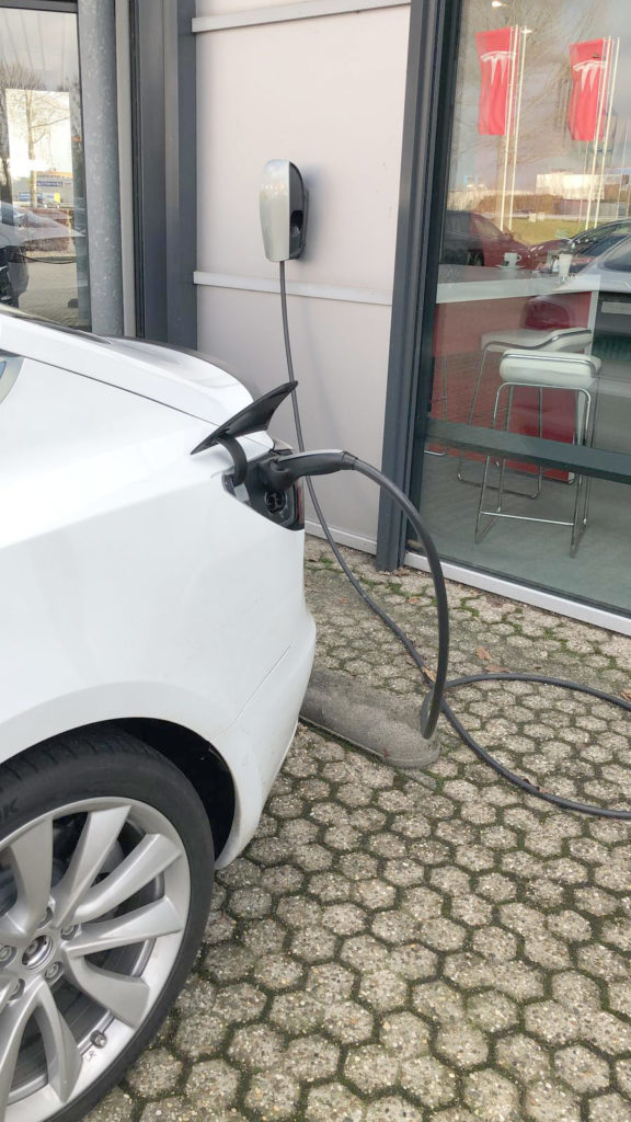 Tesla Model 3 charging with CCS charge port in Netherlands, Europe.