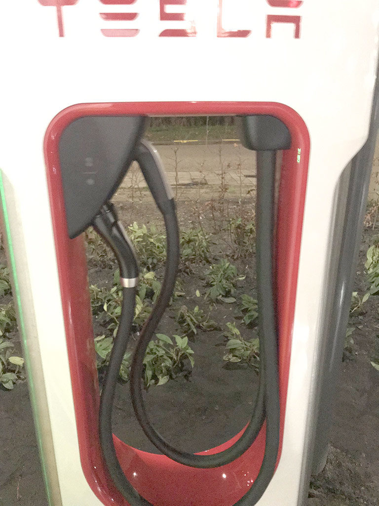 Tesla Supercharger retrofitted with CCS connector cable in Europe
