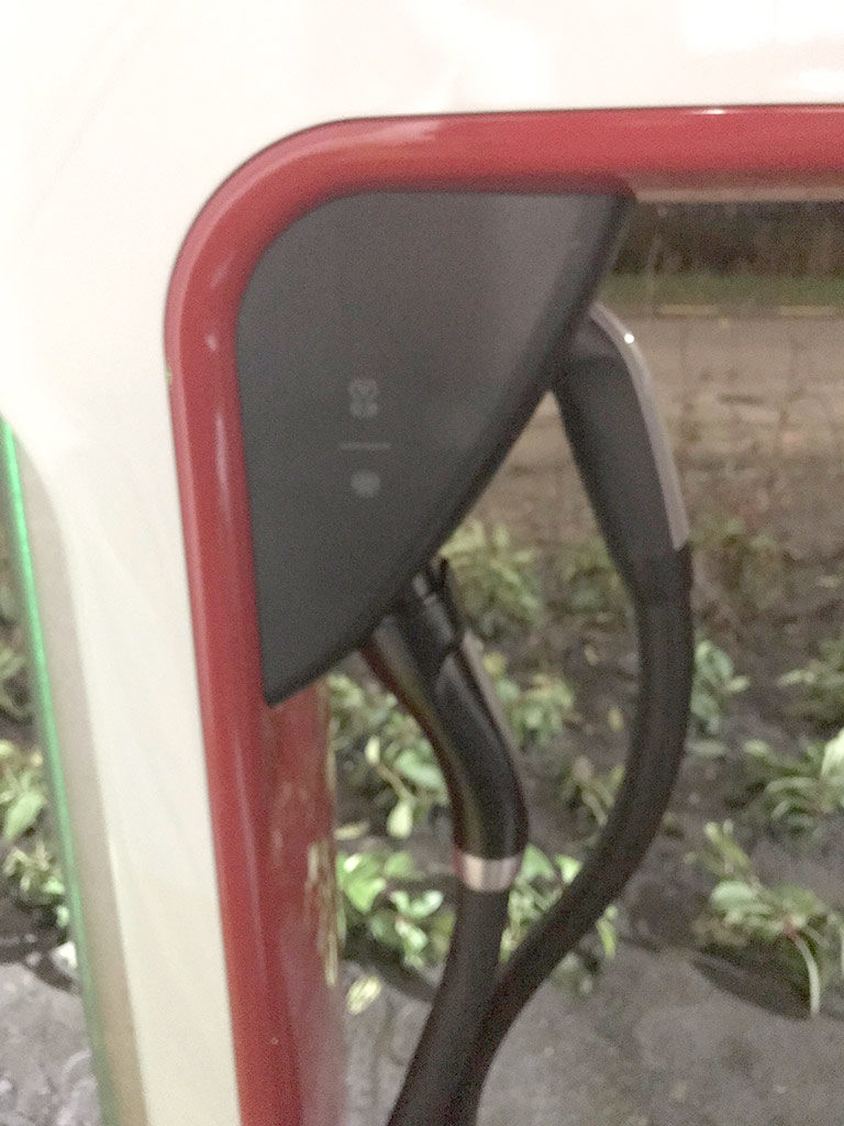 Tesla Supercharger retrofitted with CCS connector cable in Europe