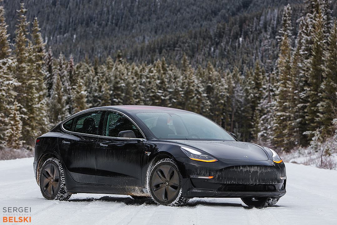 Black Tesla Model 3 in Snow - Front View