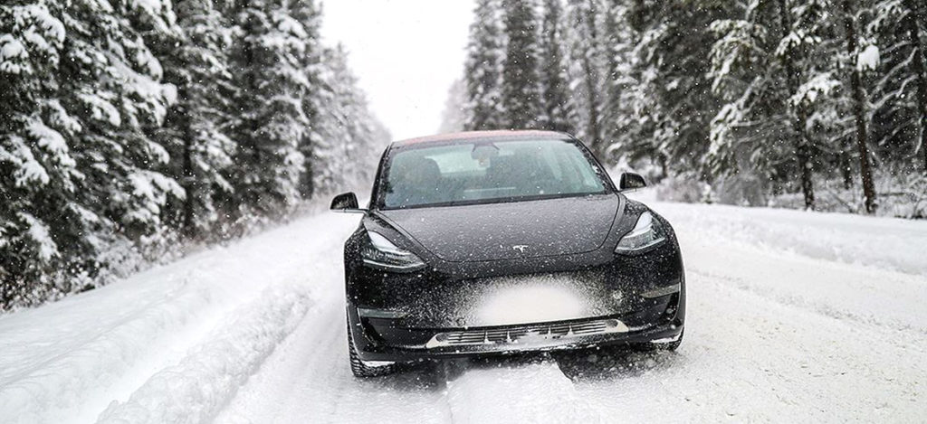 Tesla Model 3 in snow with winter tires