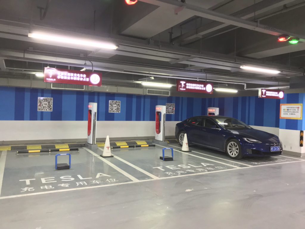 Tesla Superchargers in China with ICE vehicle blockers