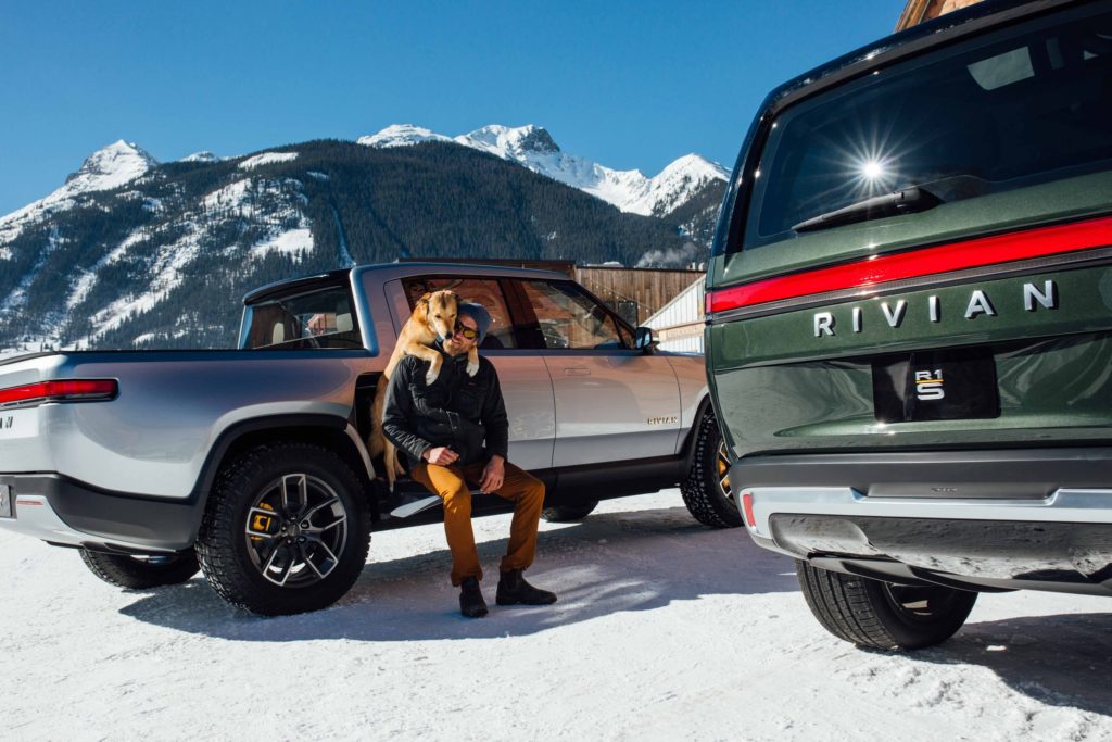 Sitting on the Rivian R1T Pickup Truck's gear tunnel door when open, gives ease of tying your shoelaces