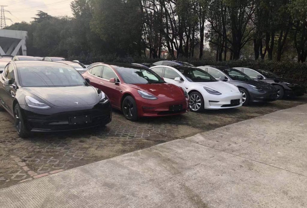 Tesla Model 3s ready for delivery at the Tesla Store Jinqiao, Shanghai.