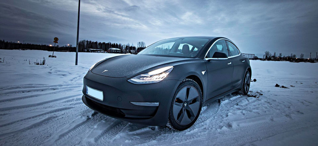 Matte Black Tesla Model 3 in snow
