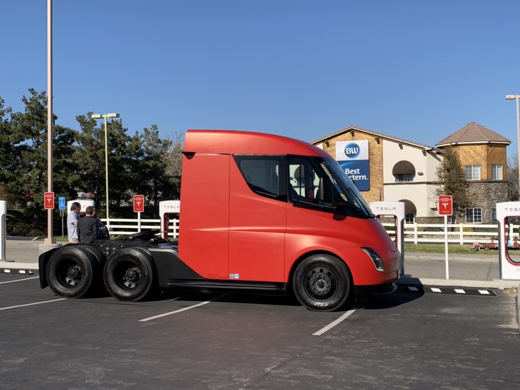 Red Tesla Semi spied at a Supercharger station - side profiile view in bobtail