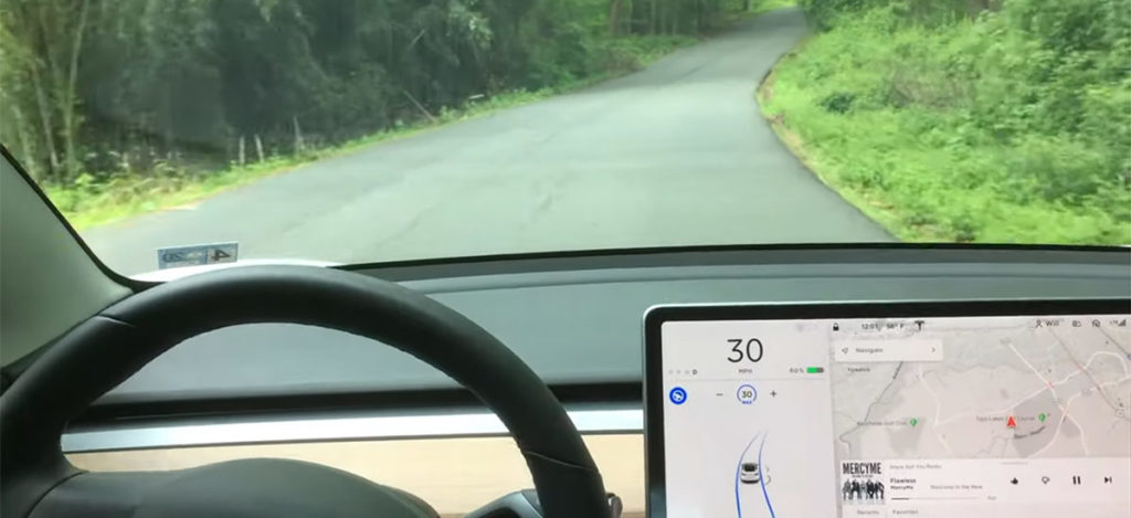 Video: Tesla Autopilot handling the road without lane markings.