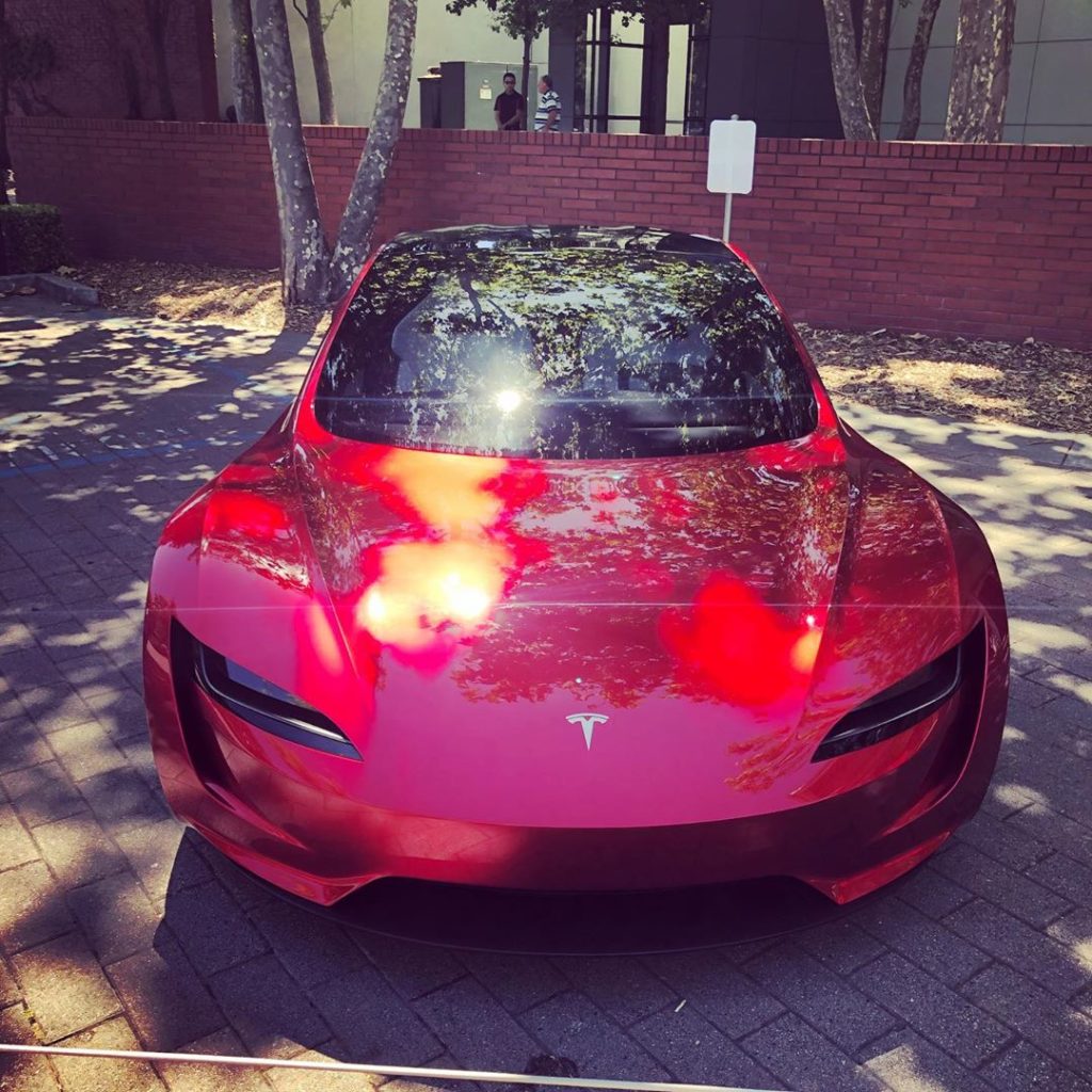 Red Tesla Roadster at the 2019 Tesla Shareholder Meeting - Front View Profile