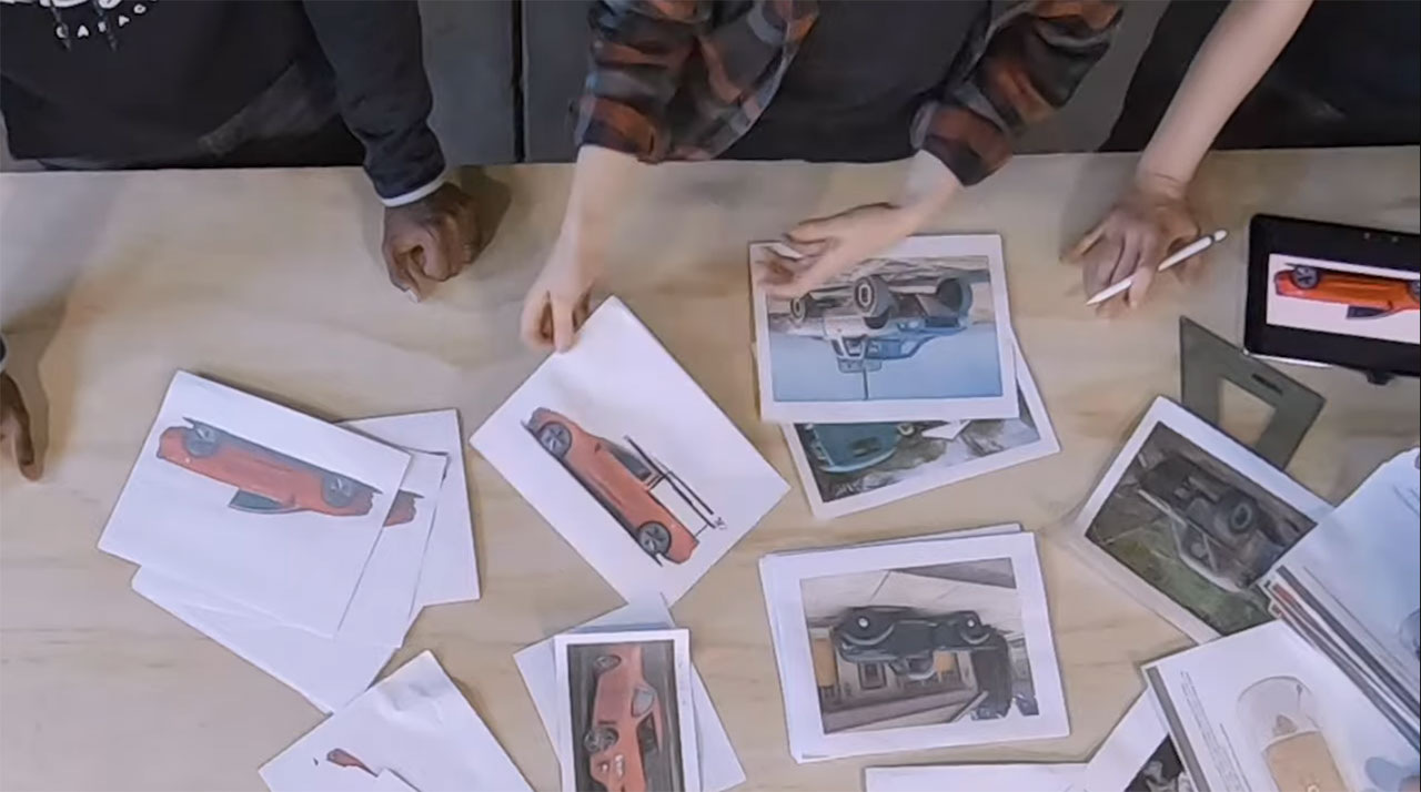 Simone Giertz's team discussing Tesla Model 3 transformed pickup truck design.