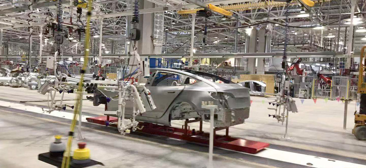 A Chinese Tesla Model 3 on the Tesla Gigafactory 3 assembly line.