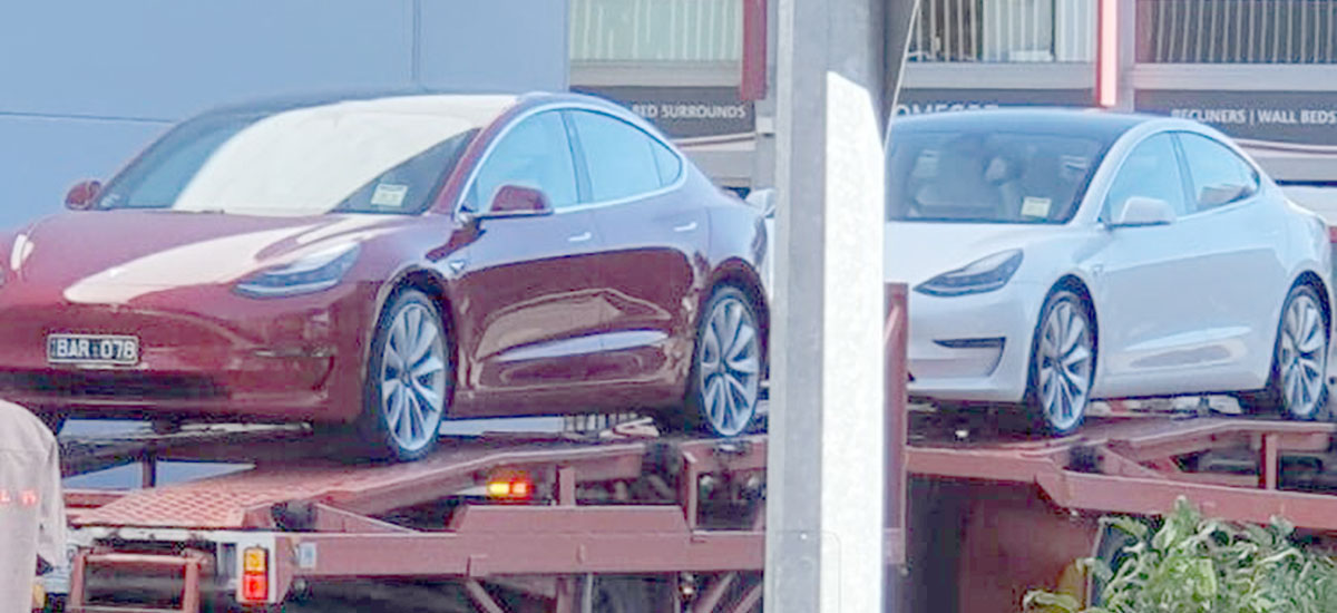Tesla Model 3 electric vehicles arrive in Brisbane, soon to be followed by a ship loaded with cars for customers.