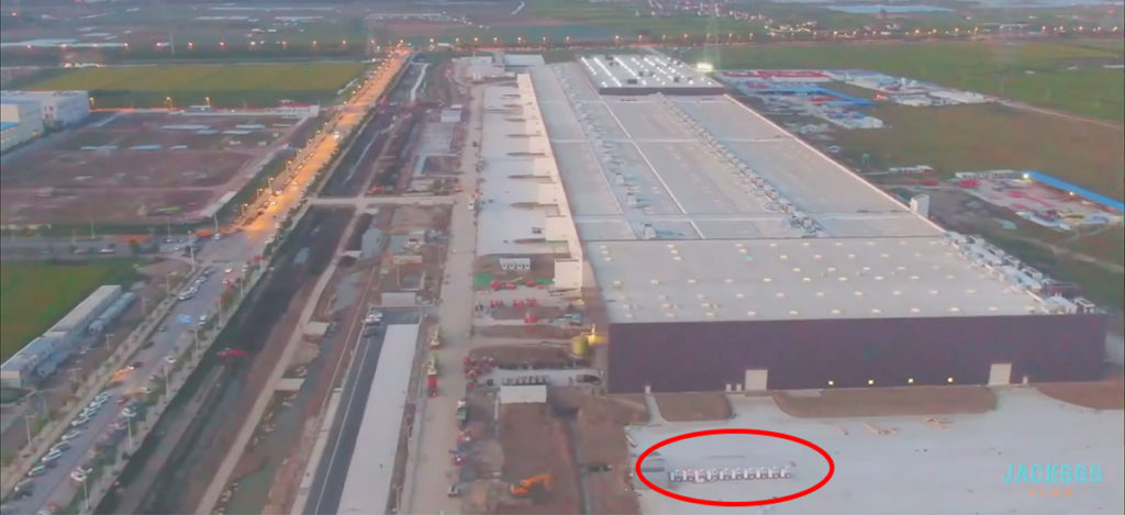 Gigafactory 3's latest footage shows a 20 stall Supercharger station.