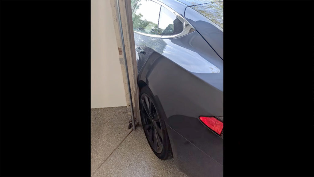 Tesla Model S damages rear left door while using Smart Summon in the garage.