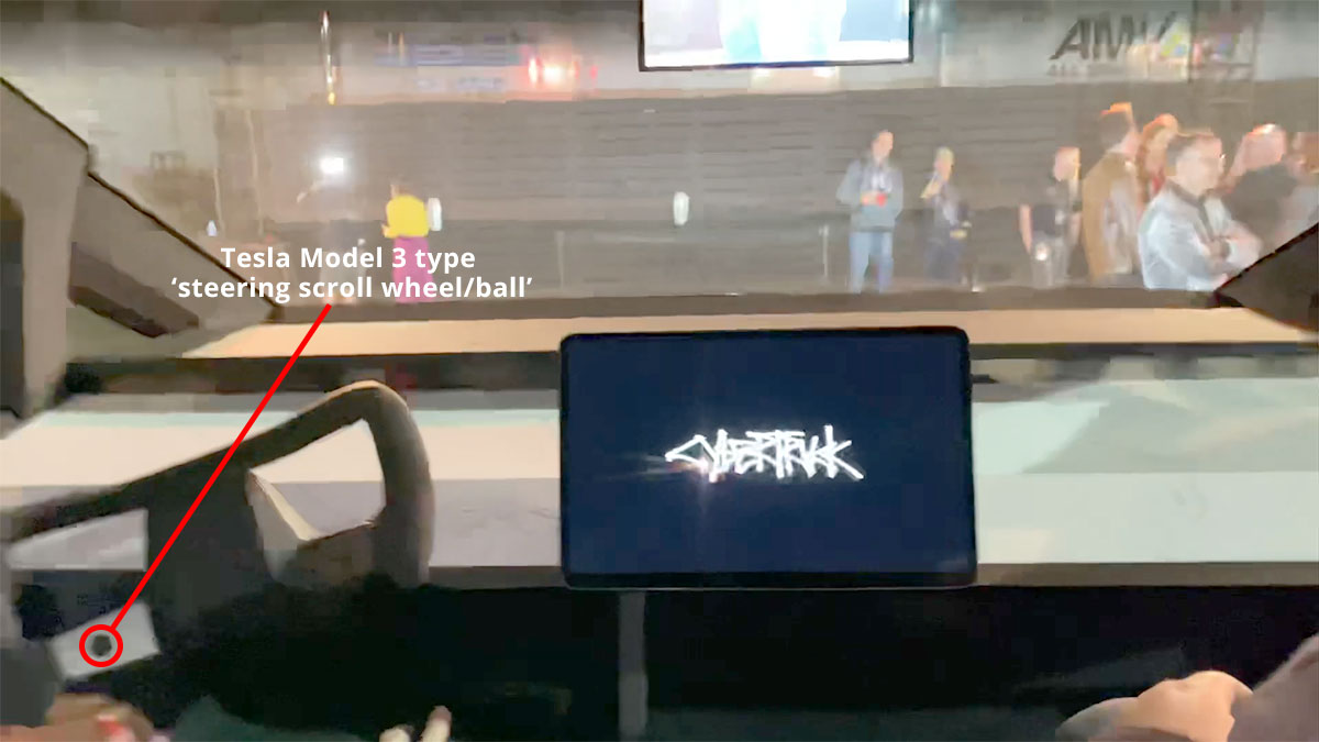 Tesla Cybertruck Steering has a scroll wheel on the left.
