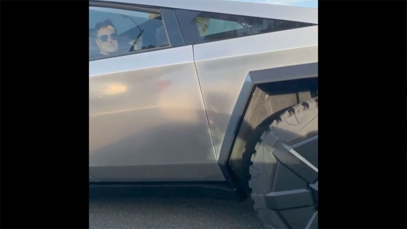 Elon Musk driving the Tesla Cybertruck.