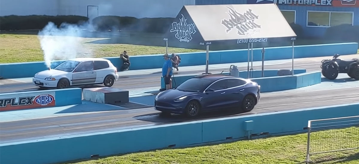 Tesla Model 3 Dual-Motor AWD vs. Civic Hatchback drag race. The Civic literally has a chimney on the hood.