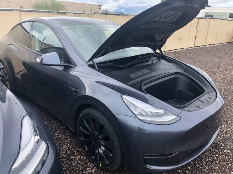Tesla Model Y front trunk lid open.