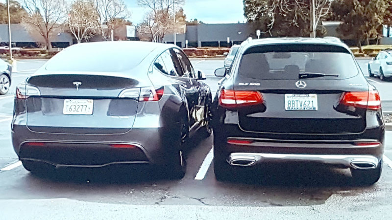 Tesla Model Y side-by-side Mercedes GLC 300 at Tesla Fremont, California.